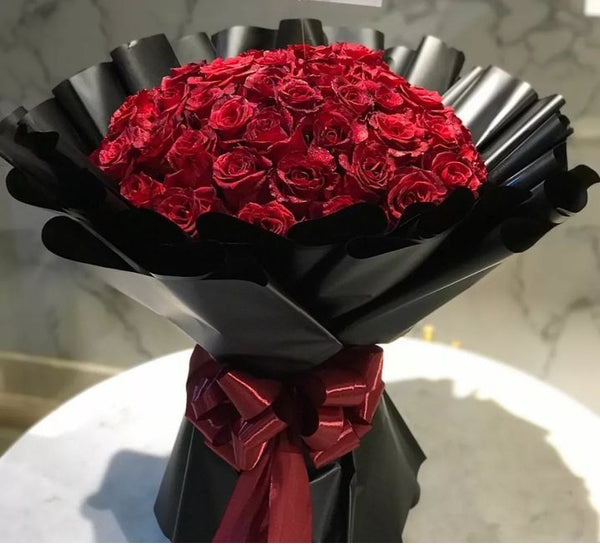 Red Roses with black wrap
